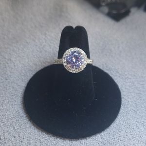 Blue round crystal in pave setting ring